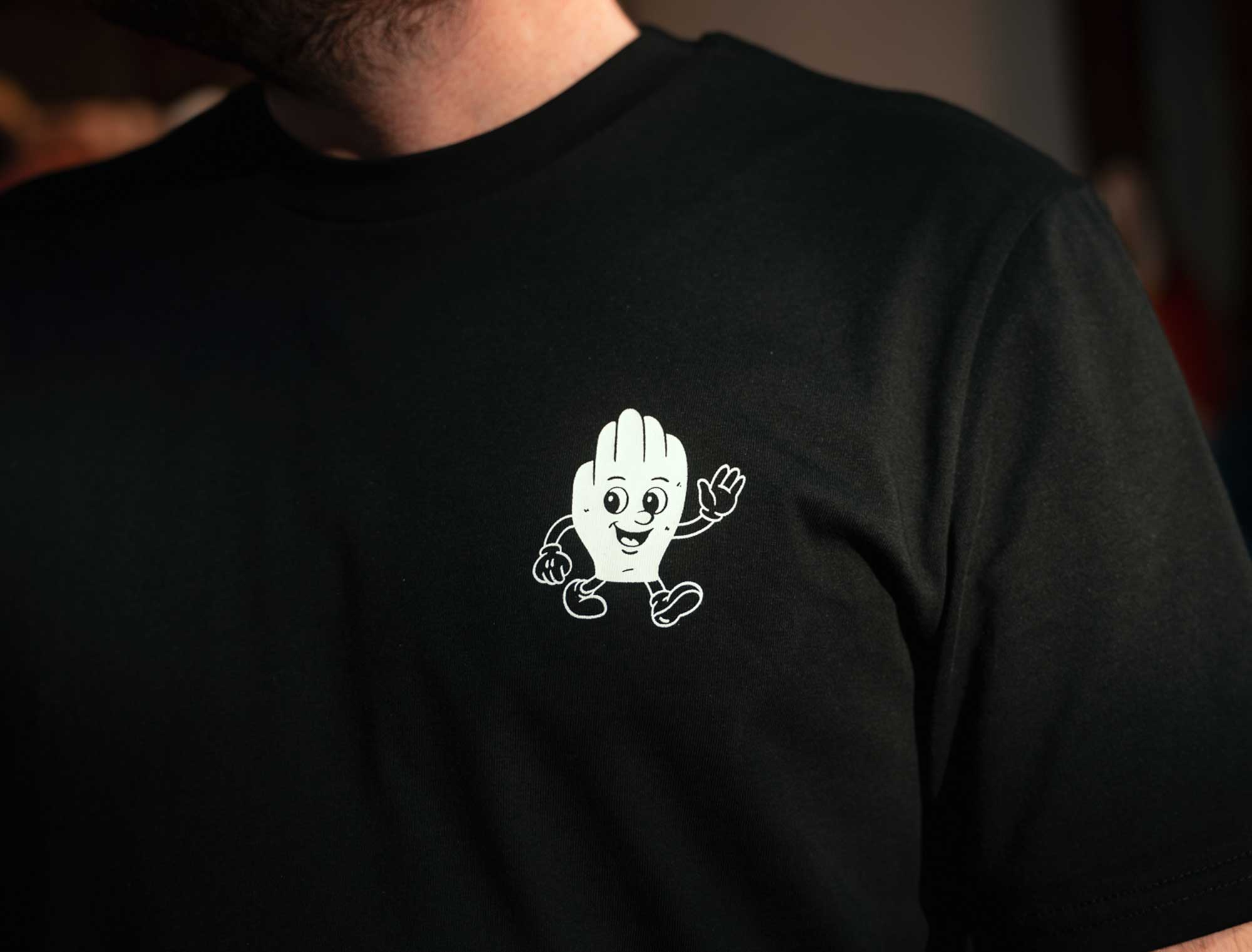 T-shirt • Antwerps Handje. • Zwart • Philip's Biscuits • Unisex