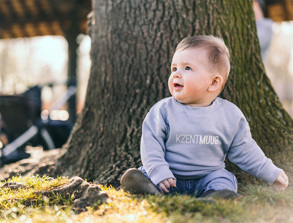Lichtblauwe baby trui met opdruk KZENTMUUG.